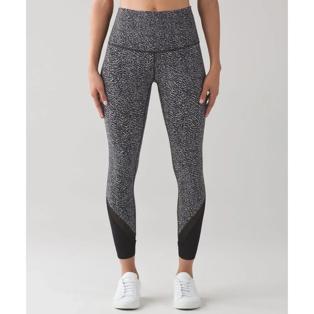 Lululemon • Wunder‎ Under Laser Cut Studio Crop Leggings • Size 8 • Black/White